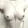 necklace with central tassel attachec to nipples with no piercing nipple rings