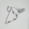 Handmade Star Septum Nose to Ear Chain with silver metallic star beads - Body Jewelry - No piercing nose required (fake nose ring)- Ring Adaptable, Fake septum, you can wear it without a nose piercing - The chain is approximately 13cm long and is only 3mm wide, which is so tiny - Hoop Nose Made from 16 gauge aluminium wire non-tarnish and antiallergenic - Each piece is created by hand, giving it a unique charm. ***************************************************************************************** Each piece is handcrafted using thick, anodized aluminium wire. Important Note: To keep the ring in perfect condition is important to know how to open and close our ring properly; look for the opening of the ring and place the fingers of each hand on each side of the opening and make a sideways movement with each hand in a reverse direction